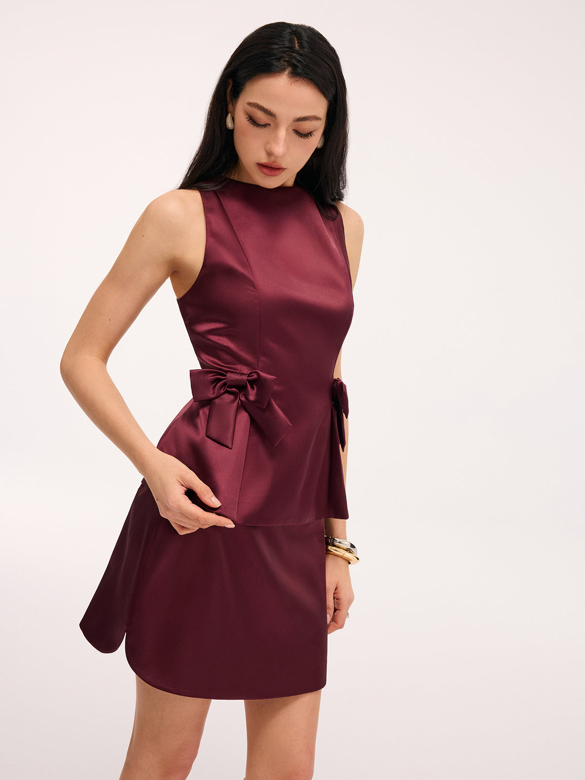 Kolsuz Fiyonklu Peplum Bluz Ve Mini Etek Takımı